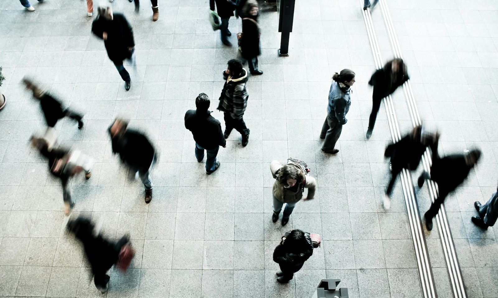 two cast iron pots over a flame